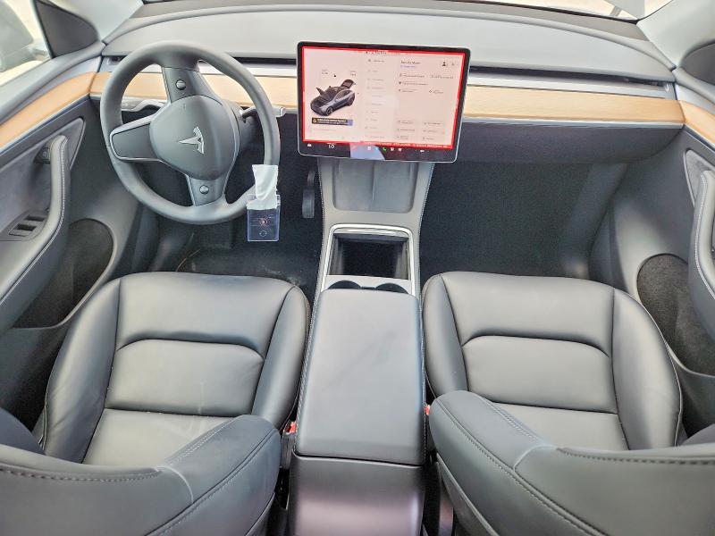 2024 Tesla Model y VIN 7SAYGDEDXRF050990 COPART salvage auction — REAR END, Fl - Cert Of Title Slvg Rebuildable, sold $8,600 on 2026-07-09 (photo 8)