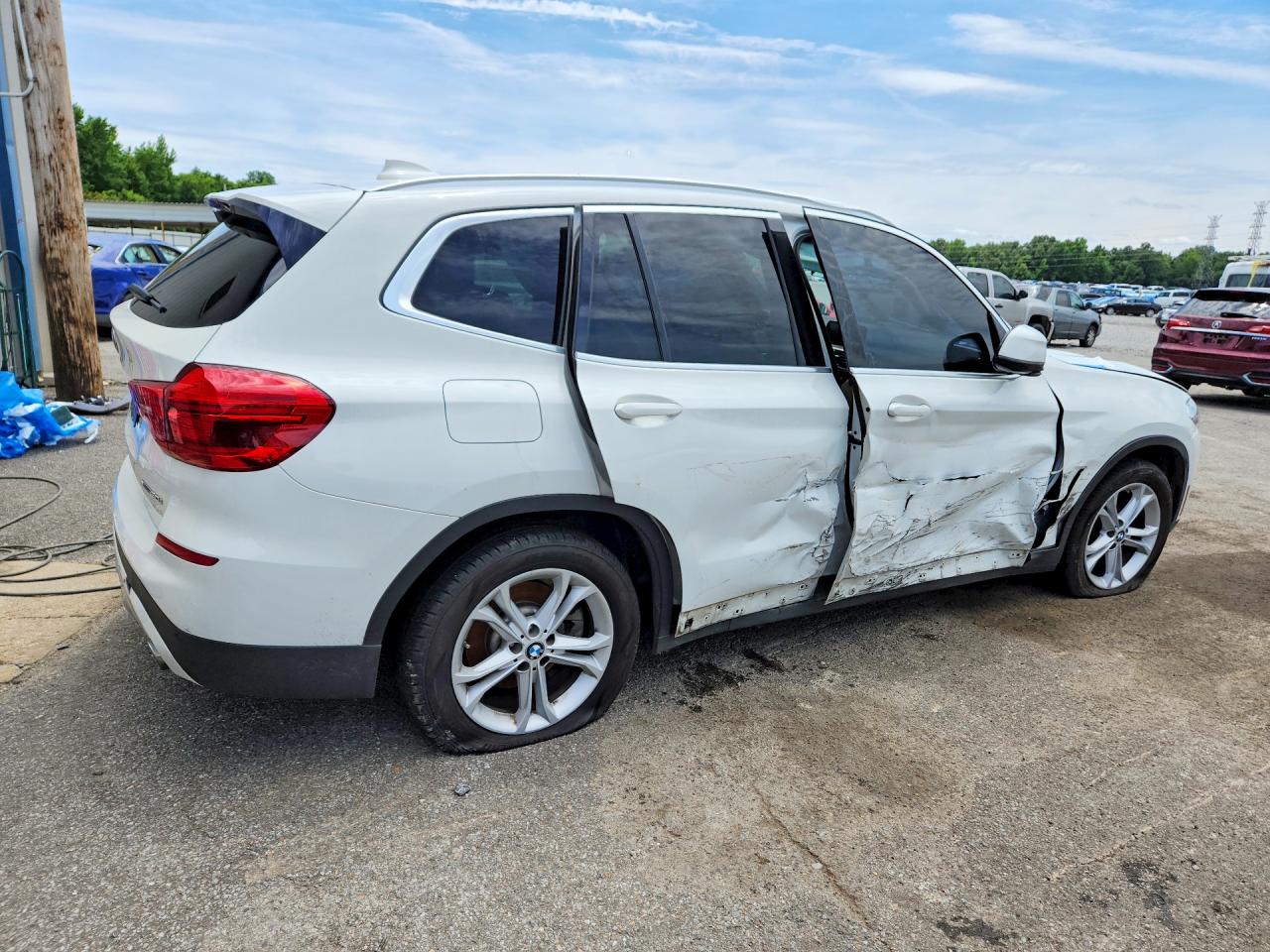 2019 BMW X3 VIN 5UXTR7C57KLF27359 COPART salvage auction — Side, TN - CERTIFICATE OF TITLE (P), sold $3,750 on 2026-06-30 (photo 3)