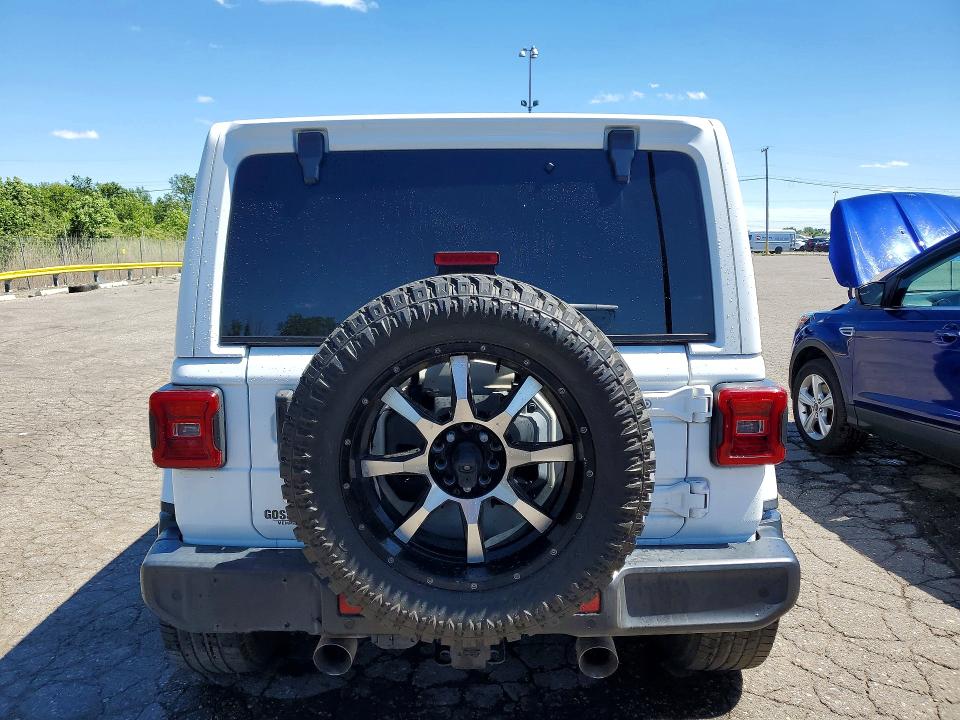 2018 Jeep Wrangler unlimited VIN 1C4HJXDG6JW110064 COPART salvage auction — MINOR DENT/SCRATCHES, MI - CERT OF TITLE-REBUILT SALVAGE, sold $11,700 on 2026-07-02 (photo 6)