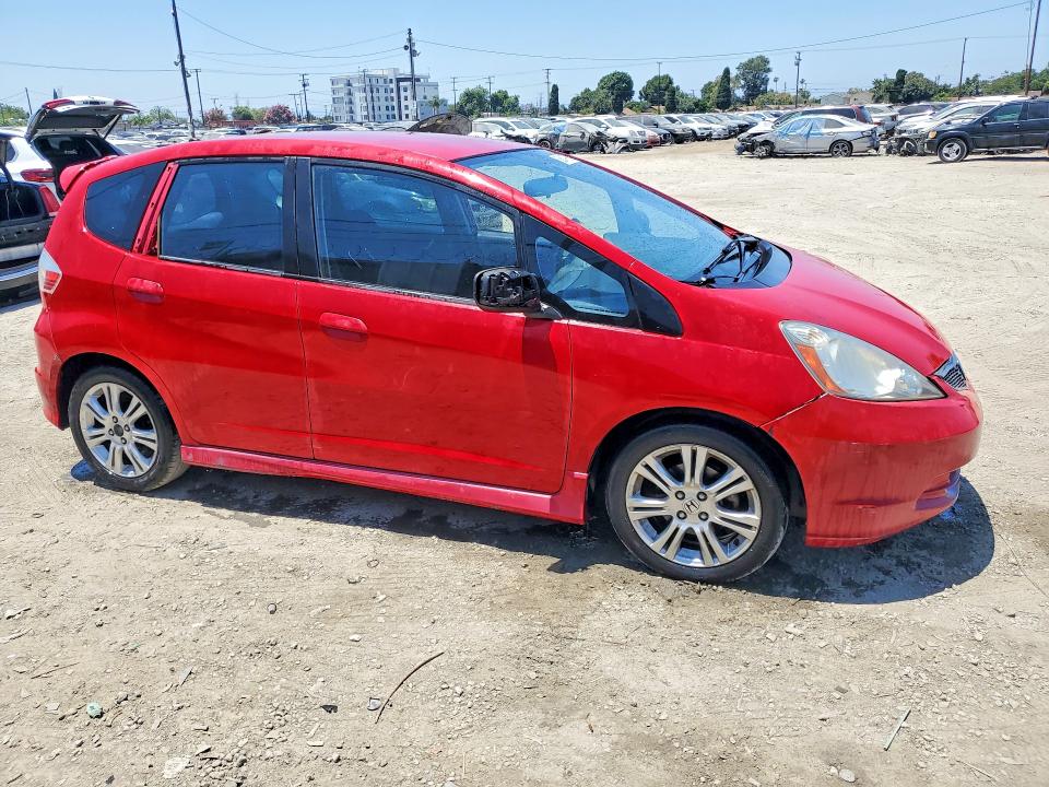 2009 Honda Fit VIN JHMGE88459S011517 COPART salvage auction — MINOR DENT/SCRATCHES, Ca - Dlr/Dis/Exp Only Salvage Title, sold $900 on 2026-07-06 (photo 4)