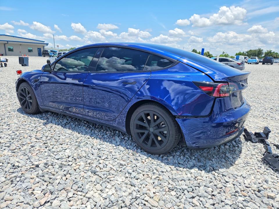2023 Tesla Model 3 VIN 5YJ3E1EA2PF581664 COPART salvage auction — REAR END, Salvage Title, sold $9,700 on 2026-07-17 (photo 2)