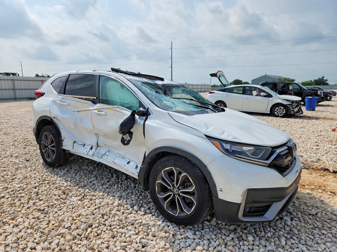 2020 Honda CR-V VIN 2HKRW1H57LH411494 COPART salvage auction — All Over, TX - SALVAGE VEHICLE TITLE (P), sold $3,100 on 2026-07-09 (photo 4)