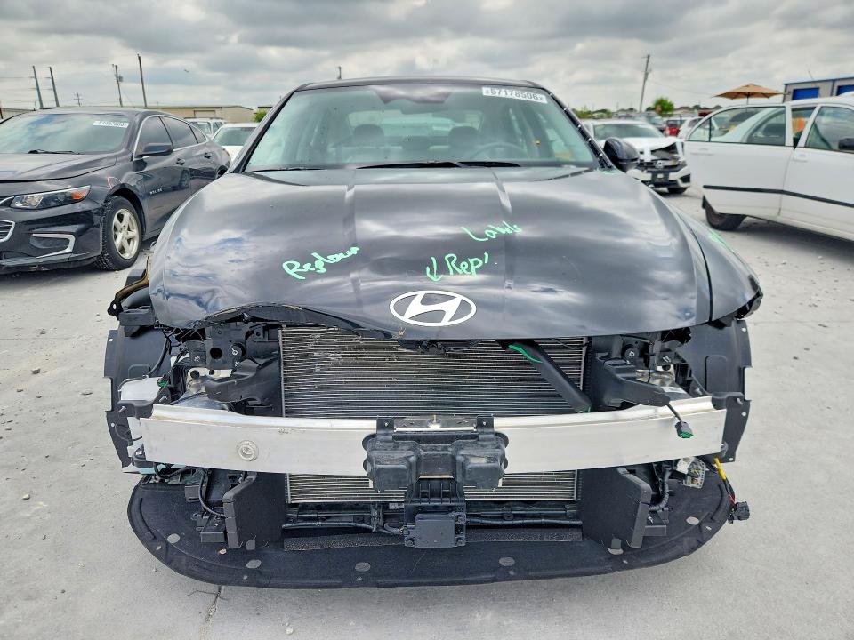 2026 Hyundai Sonata VIN KMHL64JA0TA554997 COPART salvage auction — FRONT END, TX - SALVAGE VEHICLE TITLE, sold $4,300 on 2026-07-28 (photo 5)