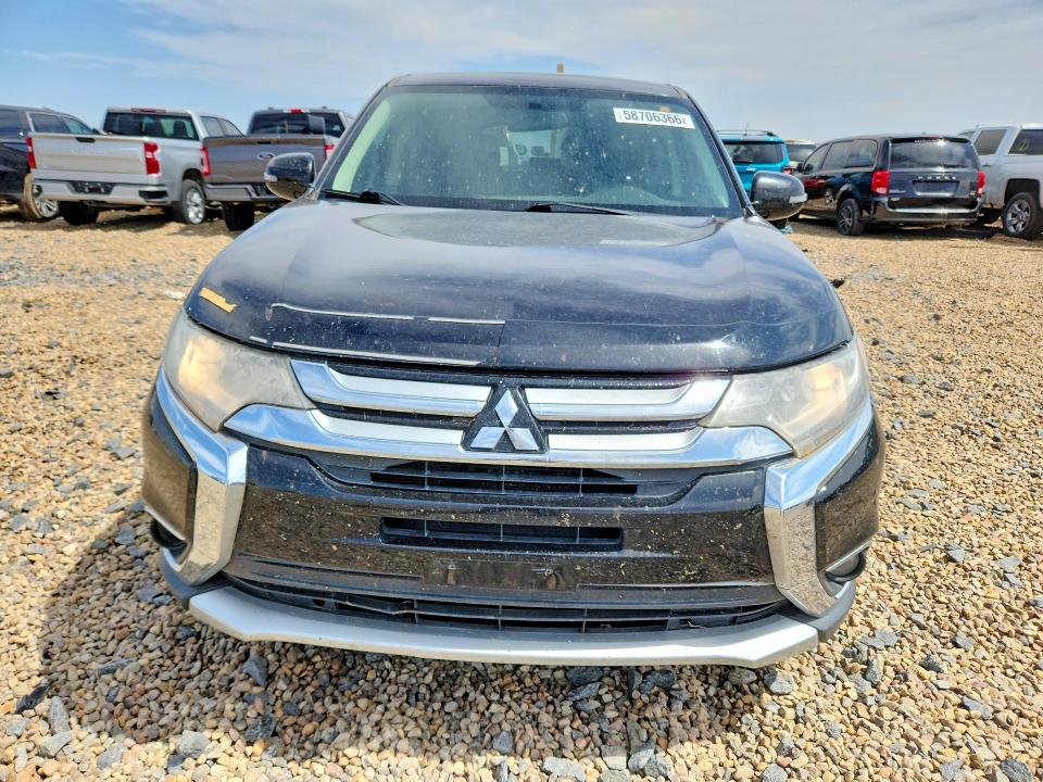 2016 Mitsubishi Outlander VIN JA4AD3A33GZ020388 COPART salvage auction — SIDE, Tx - Salvage Vehicle Title, sold $350 on 2026-07-17 (photo 5)