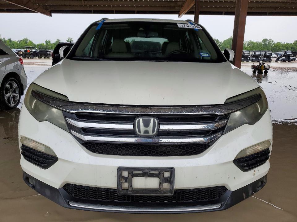 2016 Honda Pilot VIN 5FNYF5H96GB030018 COPART salvage auction — MINOR DENT/SCRATCHES, Tx - Certificate Of Title, sold $2,950 on 2026-07-09 (photo 5)
