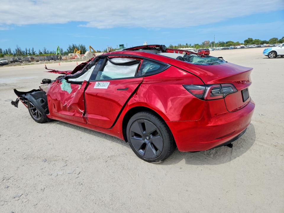 2023 Tesla Model 3 VIN 5YJ3E1EA9PF433754 COPART salvage auction — ROLLOVER, Fl - Certificate Of Destruction, sold $1,400 on 2026-07-13 (photo 2)