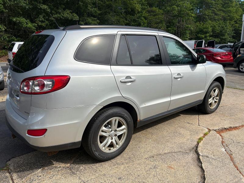 2012 Hyundai Santa fe VIN 5XYZGDAB9CG103362 COPART salvage auction — NORMAL WEAR, Me - Certificate Of Title (P), sold $2,550 on 2026-07-24 (photo 4)