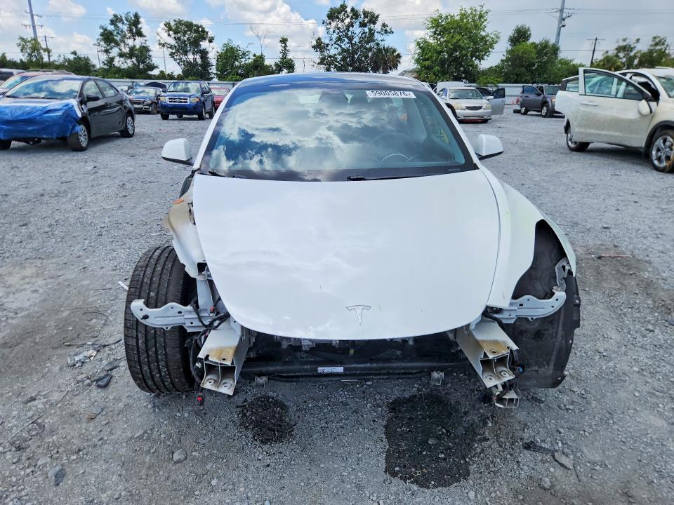 2021 Tesla VIN 5YJ3E1EA2MF053358 COPART salvage auction — FRONT END, FL - CERT OF TITLE SLVG REBUILDABLE, sold $1,450 on 2026-07-24 (photo 5)