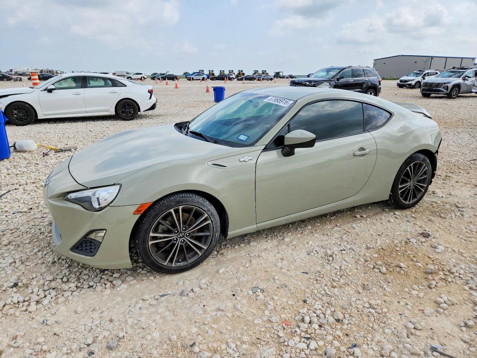 2016 Scion VIN JF1ZNAA1XG9706121 COPART salvage auction — REAR END, TX - SALVAGE VEHICLE TITLE (P), sold $1,200 on 2026-07-16 (photo 1)
