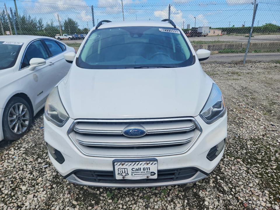 2019 Ford Escape VIN 1FMCU9HD0KUB14827 COPART salvage auction — MINOR DENT/SCRATCHES, Fl - Certificate Of Title, sold $2,050 on 2026-07-09 (photo 5)