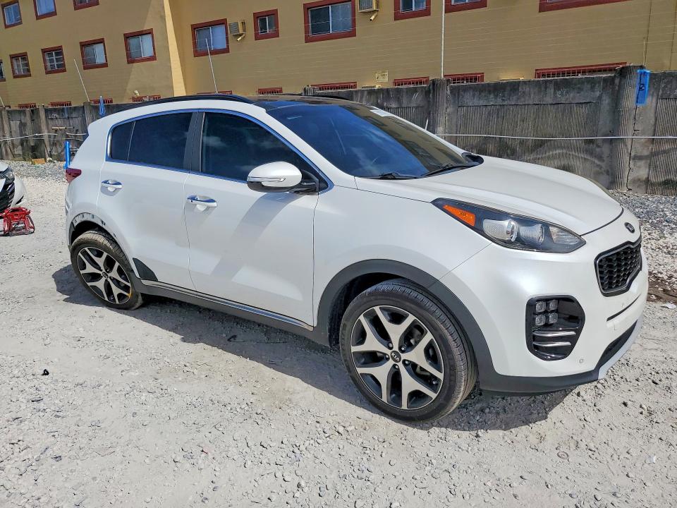 2018 Kia Sportage VIN KNDPR3A6XJ7404036 COPART salvage auction — SIDE, Fl - Cert Of Title Slvg Rebuildable, sold $4,500 on 2026-07-10 (photo 4)