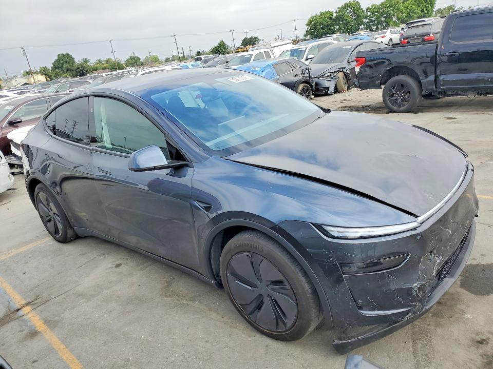 2026 Tesla Model y VIN 7SAYGDEE9TF343067 COPART salvage auction — FRONT END, Nv - Dis/Dlr/Exp Only Salvage Title, sold $23,100 on 2026-07-29 (photo 4)