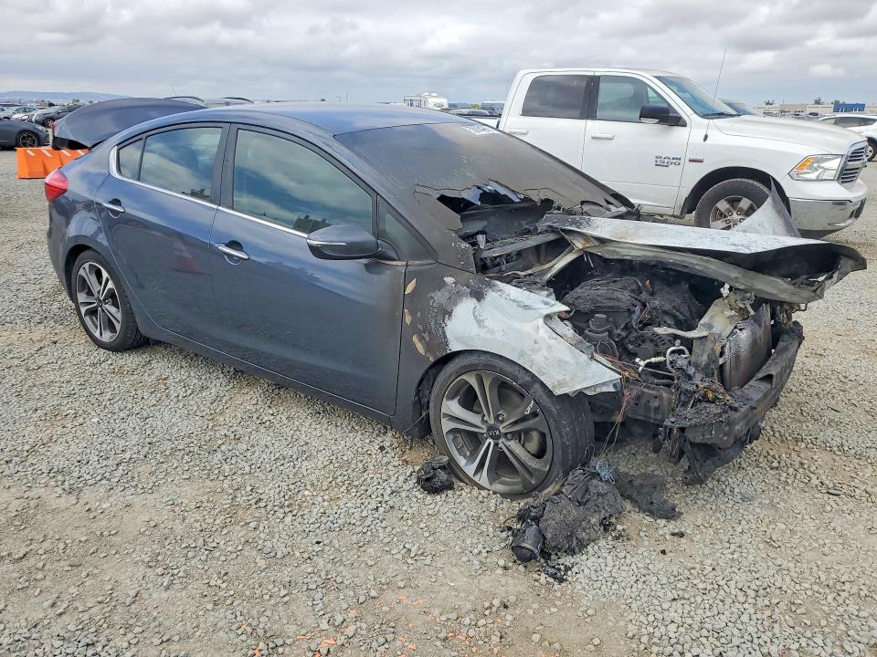 2016 Kia Forte VIN KNAFX4A89G5589934 COPART salvage auction — BURN, Ca - Salvage Certificate, sold $325 on 2026-07-24 (photo 4)