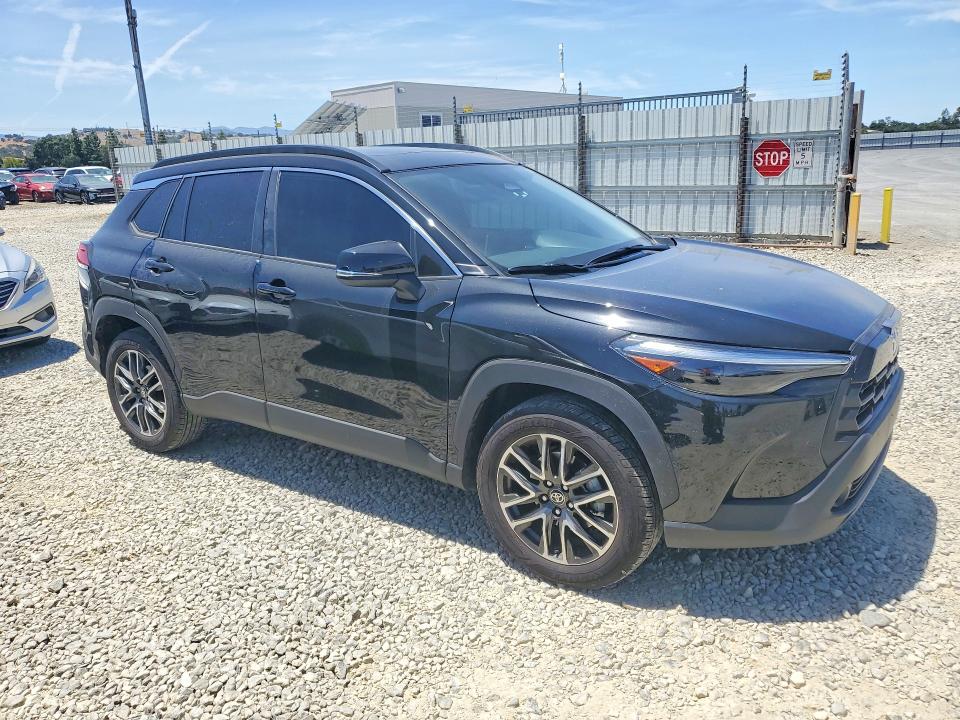 2026 Toyota Corolla cross VIN 7MUDAABGXTV167696 COPART salvage auction — SIDE, CA - SALVAGE CERTIFICATE, sold $11,100 on 2026-07-28 (photo 4)