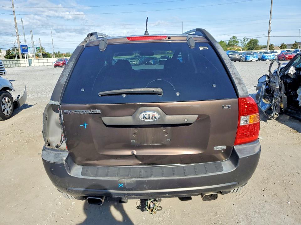 2006 Kia Sportage VIN KNDJF723867289924 COPART salvage auction — REAR END, FL - CERT OF TITLE SLVG REBUILDABLE, sold $900 on 2026-07-17 (photo 6)