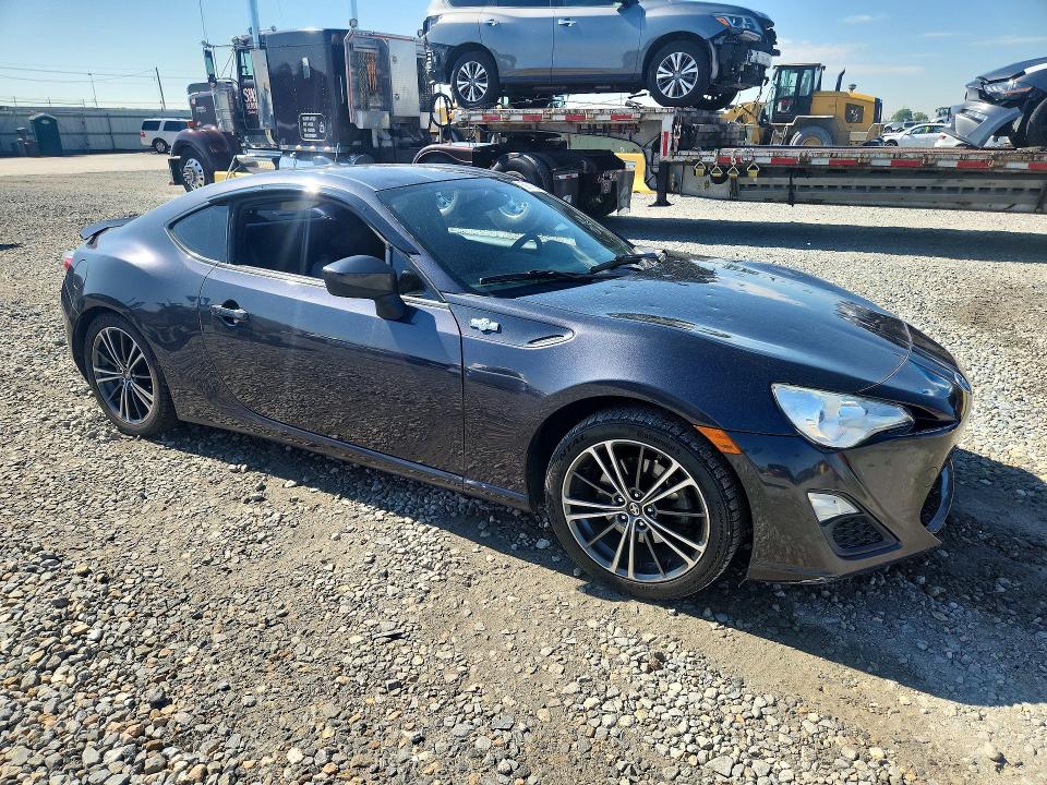 2015 Scion VIN JF1ZNAA15F9703254 COPART salvage auction — REAR END, Co - Salvage Title, sold $1,700 on 2026-07-28 (photo 4)