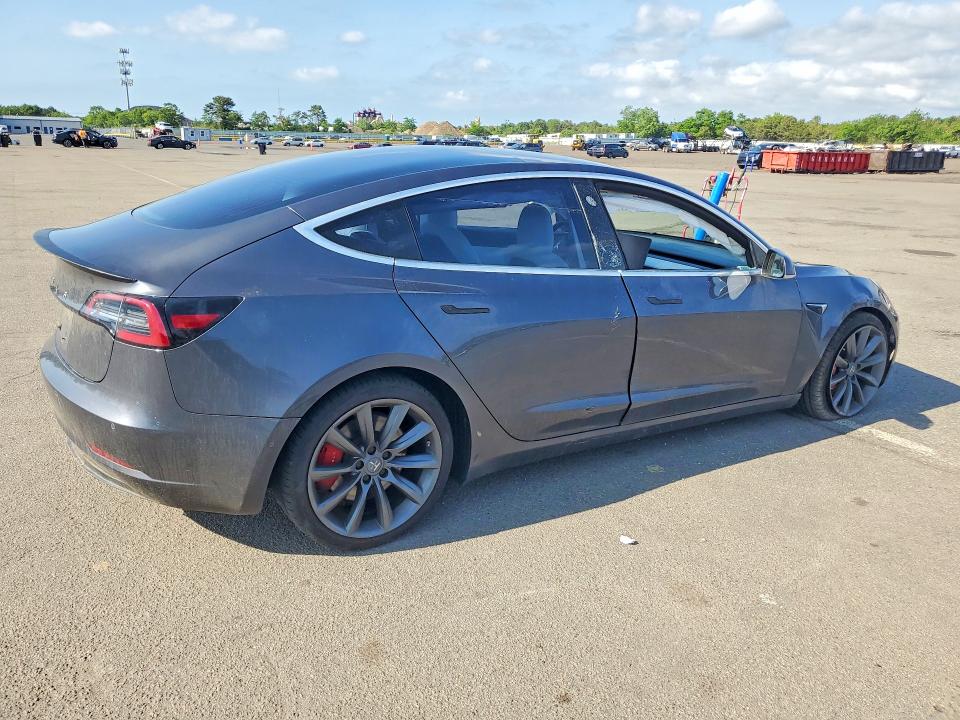 2018 Tesla Model 3 VIN 5YJ3E1EB8JF079385 COPART salvage auction — SIDE, Ny - Mv-907A Salvage Certificate, sold $6,100 on 2026-07-15 (photo 3)