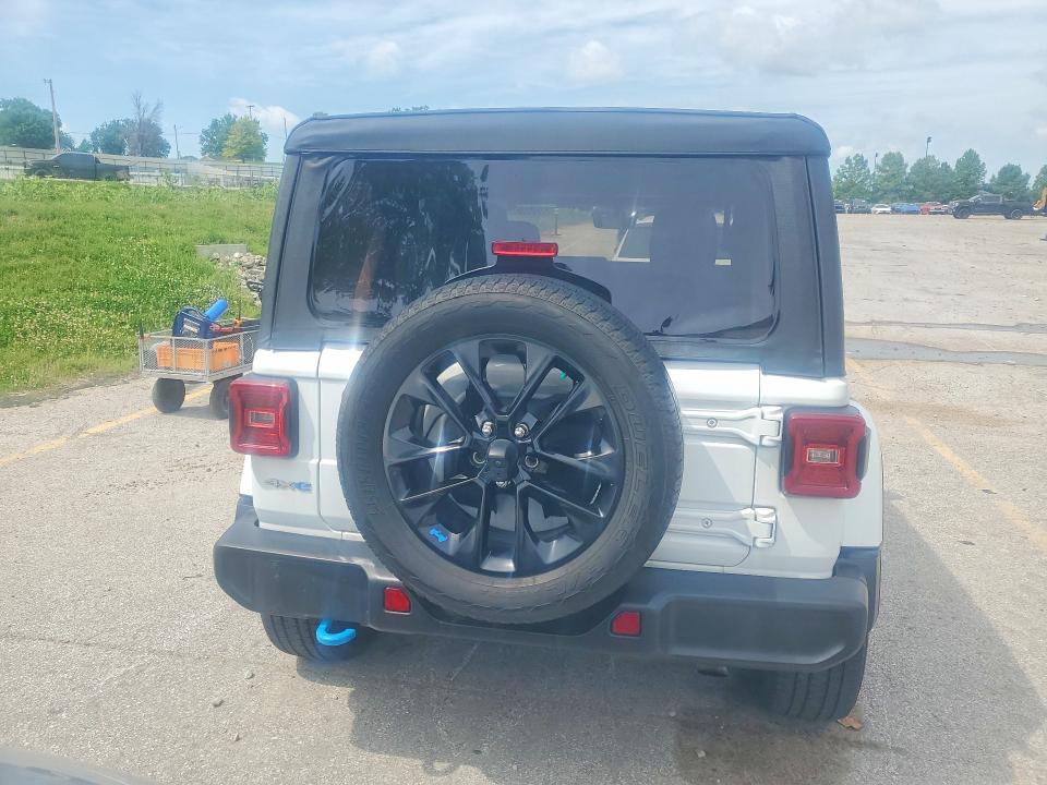2022 Jeep Wrangler unlimited VIN 1C4JJXP60NW117859 COPART salvage auction — MINOR DENT/SCRATCHES, Il - Certificate Of Title, sold $20,750 on 2026-07-16 (photo 6)