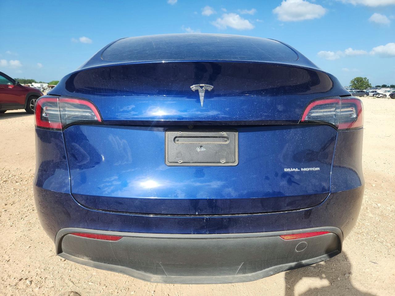 2023 Tesla Model Y VIN 7SAYGDEE6PA107897 COPART salvage auction — Front End, TX - SALVAGE VEHICLE TITLE, sold $9,000 on 2026-07-09 (photo 6)