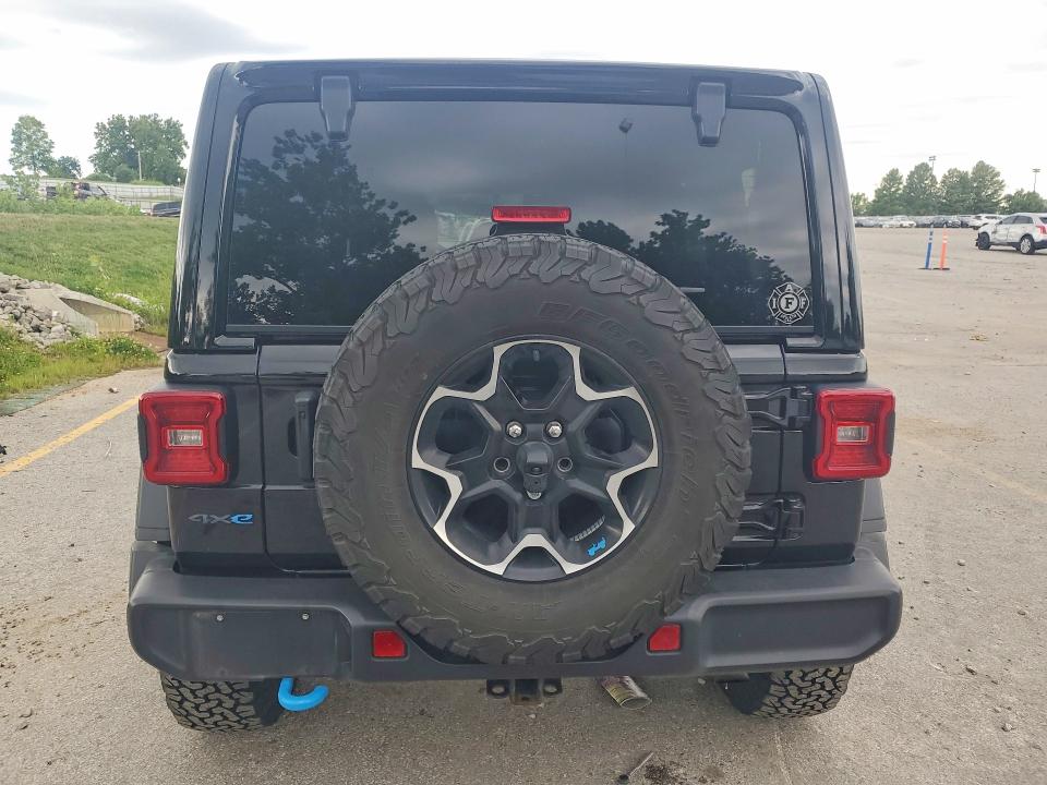 2022 Jeep Wrangler unlimited VIN 1C4JJXR65NW171378 COPART salvage auction — MINOR DENT/SCRATCHES, Mo - Certificate Of Title, sold $21,500 on 2026-07-16 (photo 6)