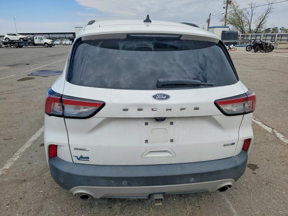 2020 Ford Escape VIN 1FMCU9H91LUB30449 COPART salvage auction — SIDE, Tx - Salvage Vehicle Title, sold $3,600 on 2026-07-24 (photo 6)