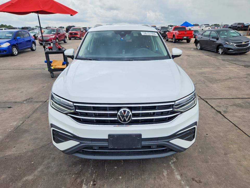2024 Volkswagen VIN 3VV3B7AX4RM067854 COPART salvage auction — SIDE, Tx - Salvage Vehicle Title, sold $7,900 on 2026-07-30 (photo 5)