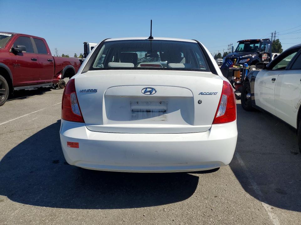 2011 Hyundai Accent VIN KMHCN4ACXBU606640 COPART salvage auction — MINOR DENT/SCRATCHES, Ca - Dis/Dlr/Exp Only Clean Title, sold $475 on 2026-07-28 (photo 6)