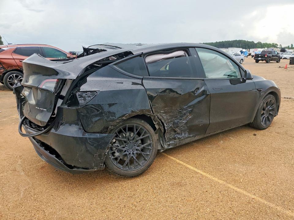 2023 Tesla VIN 7SAYGDEE8PA146961 COPART salvage auction — REAR END, TX - SALVAGE VEHICLE TITLE (P), sold $6,300 on 2026-07-20 (photo 3)