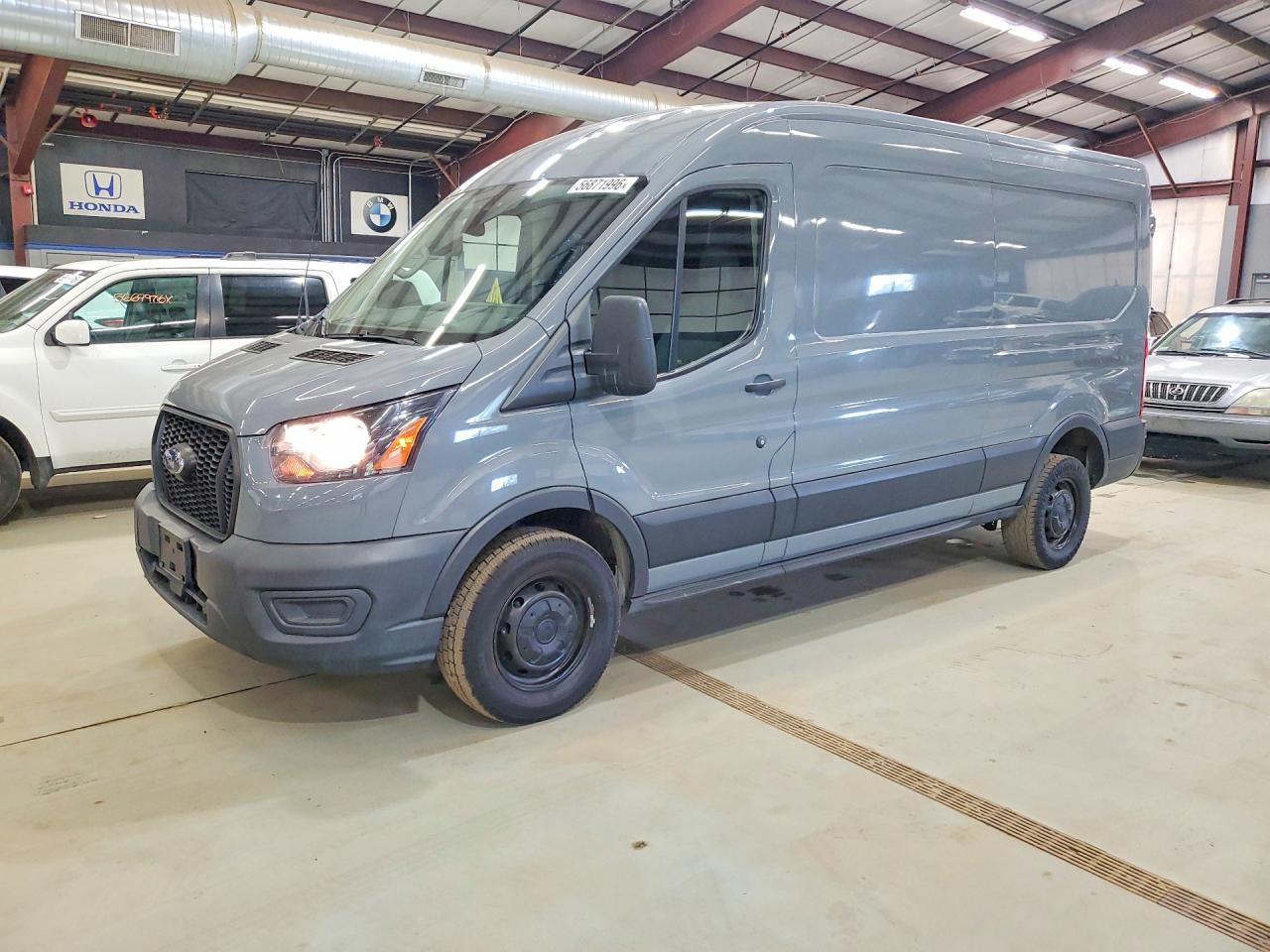 2021 Ford Transit VIN 1FTBR1C84MKA48438 — COPART salvage auction photo