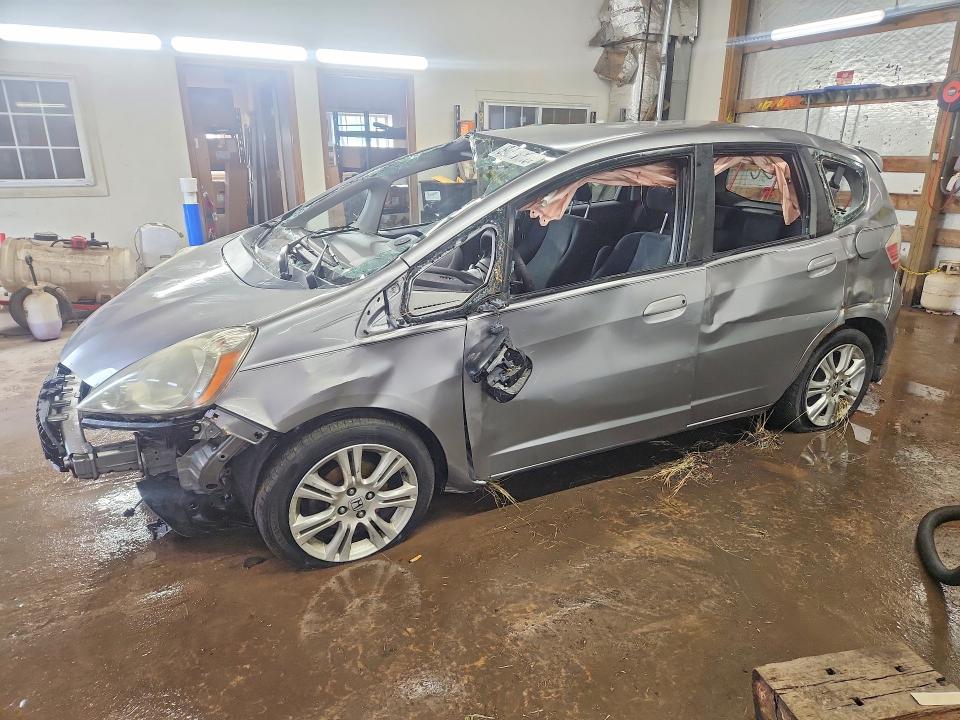 2009 Honda Fit VIN JHMGE88409S029391 COPART salvage auction — ROLLOVER, IL - JUNKING CERT OF A VEHICLE, sold $175 on 2026-07-13 (photo 1)