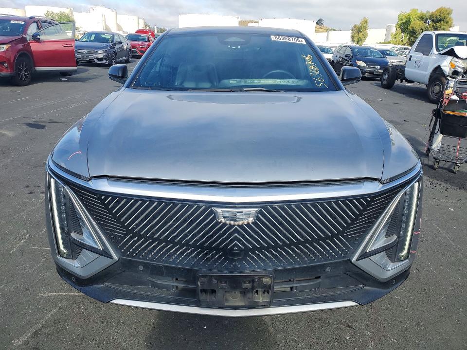 2024 Cadillac Lyriq VIN 1GYKPMRL8RZ100195 COPART salvage auction — REAR END, Ca - Salvage Certificate, sold $13,000 on 2026-07-20 (photo 5)