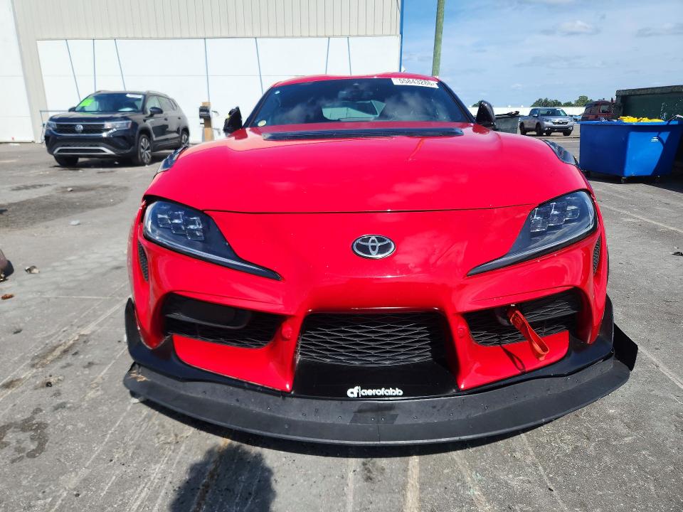 2022 Toyota Supra VIN WZ1DB0C07NW051668 COPART salvage auction — SIDE, FL - CERT OF TITLE SLVG REBUILDABLE, sold $17,300 on 2026-07-20 (photo 5)