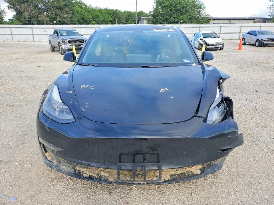 2021 Tesla Model 3 VIN 5YJ3E1EA7MF064467 COPART salvage auction — FRONT END, TX - SALVAGE VEHICLE TITLE (P), sold $4,000 on 2026-07-16 (photo 5)