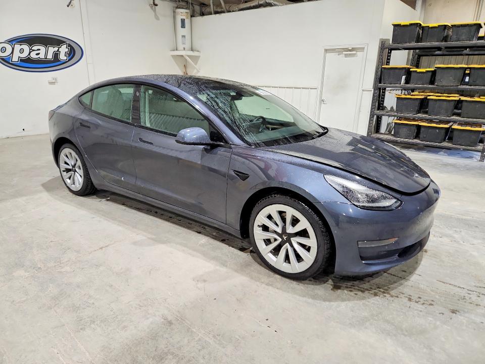 2022 Tesla Model 3 VIN 5YJ3E1EA9NF368563 COPART salvage auction — ALL OVER, Fl - Certificate Of Title, sold $8,600 on 2026-07-06 (photo 4)