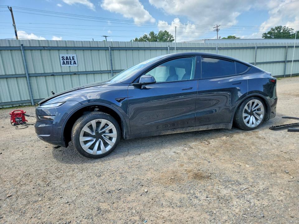 2026 Tesla VIN 7SAYGDEDXTA609183 COPART salvage auction — SIDE, Tx - Salvage Vehicle Title, sold $5,600 on 2026-07-23 (photo 1)