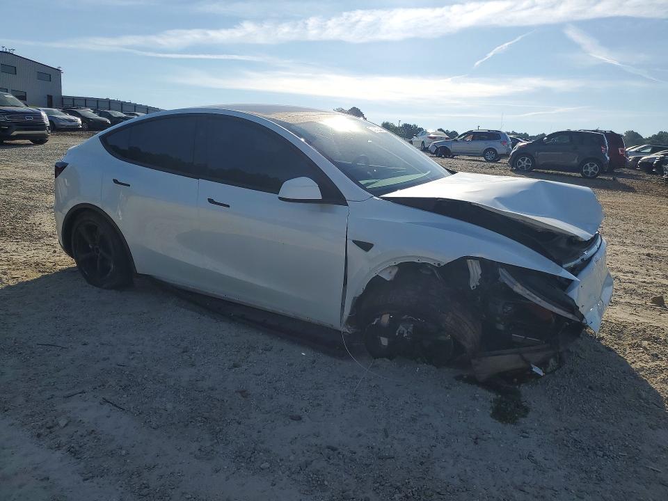 2026 Tesla Model y VIN 7SAYGDEE7TA447327 COPART salvage auction — VANDALISM, GA - CERT OF TITLE-SALVAGE (P), sold $13,900 on 2026-07-15 (photo 4)