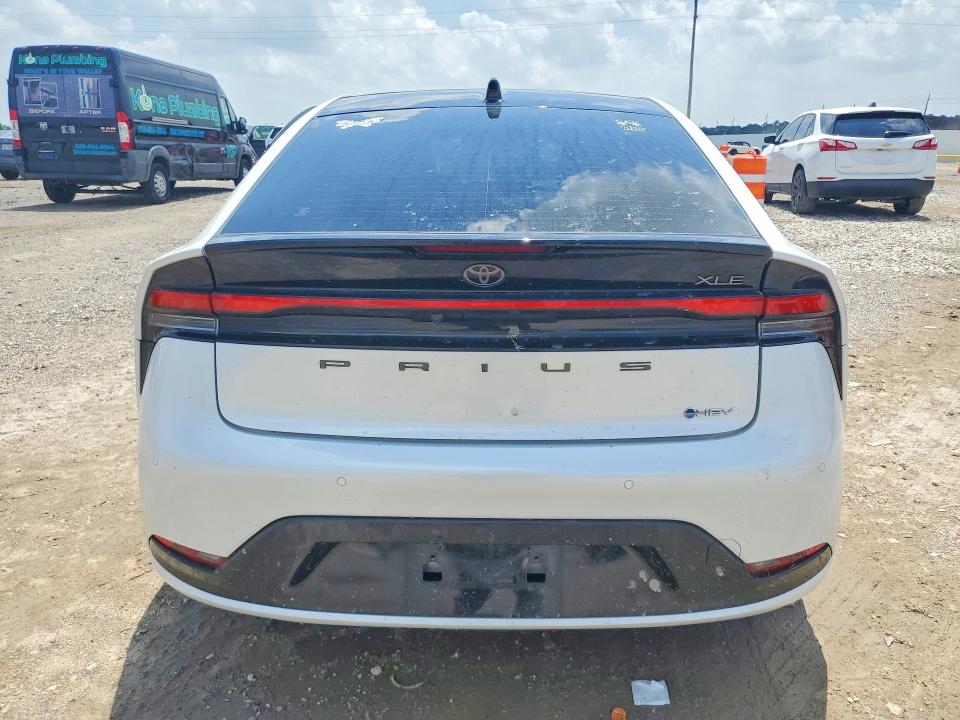 2023 Toyota Prius VIN JTDACAAU0P3011687 COPART salvage auction — SIDE, TX - SALVAGE VEHICLE TITLE (P), sold $7,000 on 2026-07-23 (photo 6)