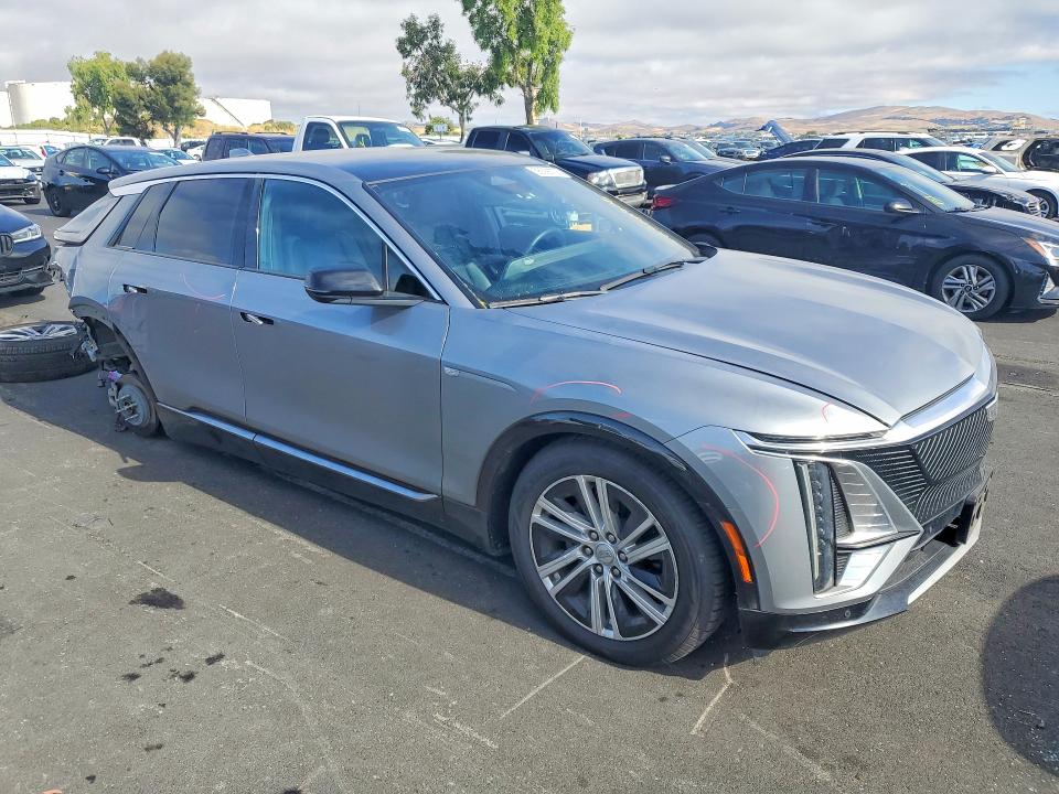 2024 Cadillac Lyriq VIN 1GYKPMRL8RZ100195 COPART salvage auction — REAR END, Ca - Salvage Certificate, sold $13,000 on 2026-07-20 (photo 4)