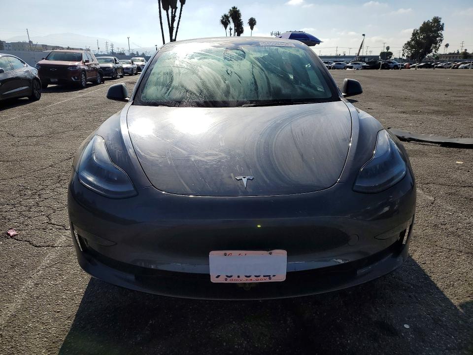 2023 Tesla VIN 5YJ3E1EA0PF581632 COPART salvage auction — REAR END, Ca - Salvage Certificate, sold $5,500 on 2026-07-28 (photo 5)