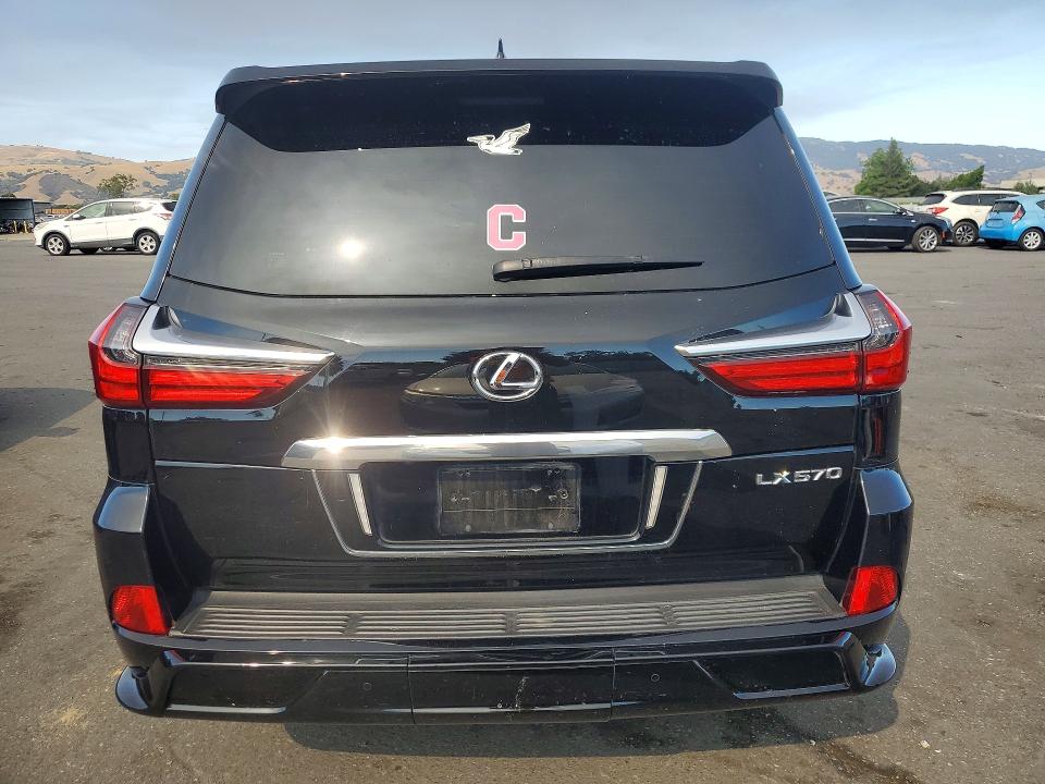 2021 Lexus Lx 570 VIN JTJDY7AX2M4342625 COPART salvage auction — SIDE, CA - SALVAGE CERTIFICATE, sold $52,500 on 2026-07-21 (photo 6)