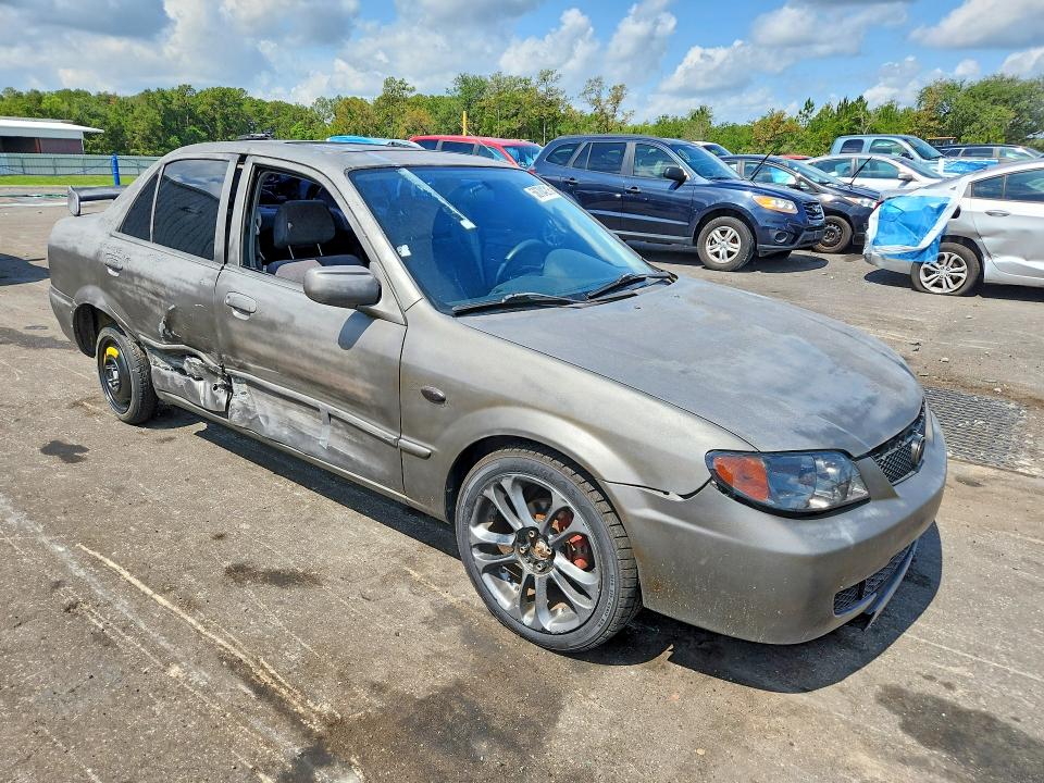2002 Mazda Protege VIN JM1BJ225X21599996 COPART salvage auction — SIDE, FL - CERT OF TITLE SLVG REBUILDABLE, sold $250 on 2026-07-22 (photo 4)
