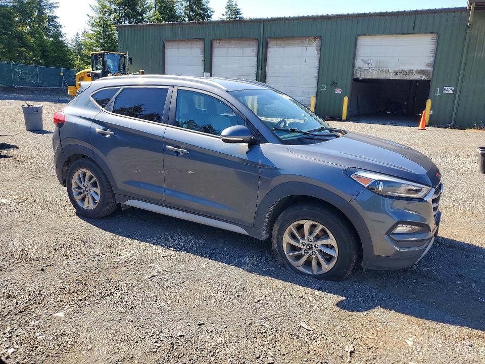 2017 Hyundai Tucson VIN KM8J3CA25HU421192 COPART salvage auction — SIDE, WA - VEHICLE CERT OF OWNERSHIP-TITL, sold $2,300 on 2026-07-07 (photo 4)