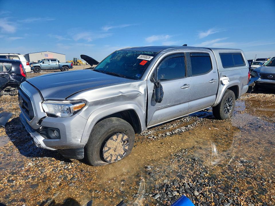 2021 Toyota Tacoma VIN 5TFAZ5CN2MX100113 COPART salvage auction — ROLLOVER, Tx - Salvage Vehicle Title, sold $8,100 on 2026-07-14 (photo 1)