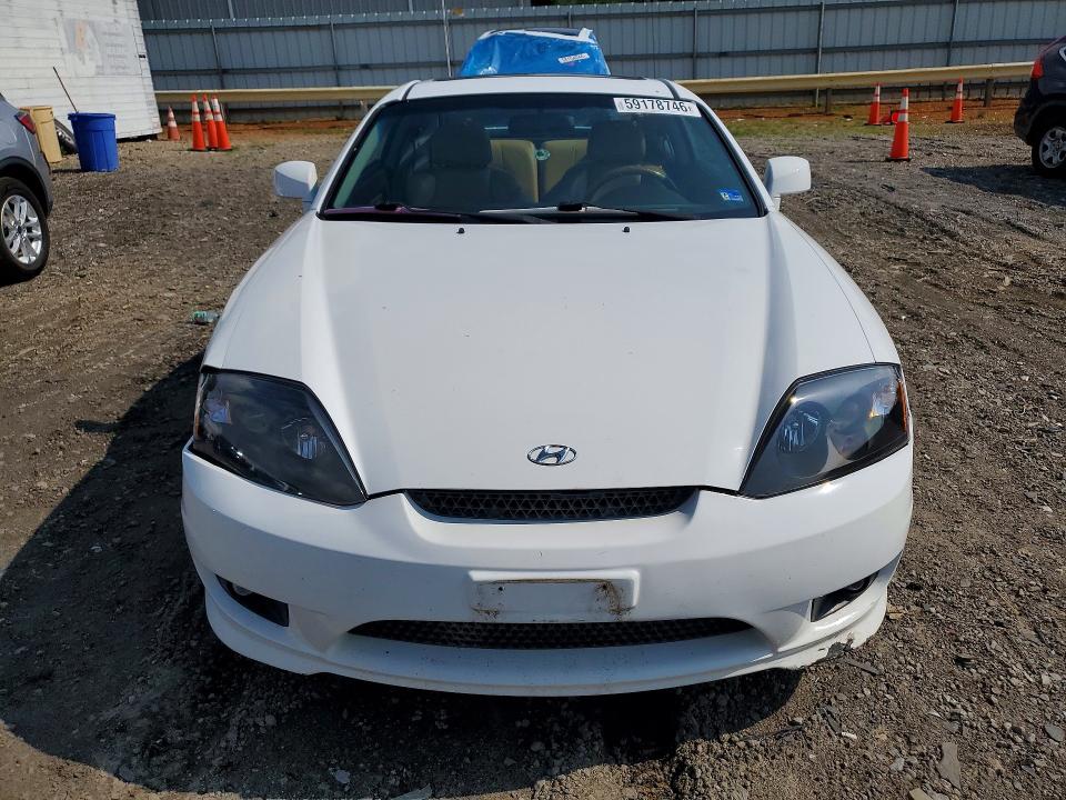 2006 Hyundai Tiburon VIN KMHHN65F06U225519 COPART salvage auction — FRONT END, VA - CERT OF TITLE - SALVAGE, sold $250 on 2026-07-10 (photo 5)