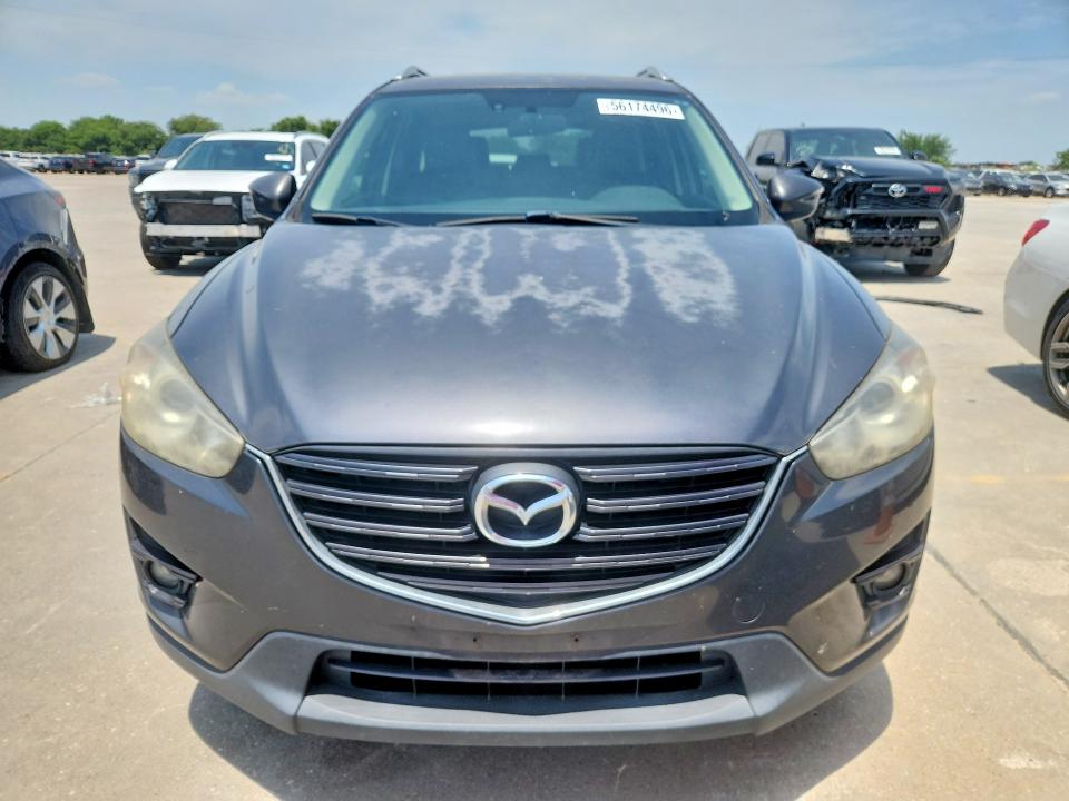 2016 Mazda VIN JM3KE2DY9G0810329 COPART salvage auction — HAIL, Tx - Certificate Of Title, sold $2,200 on 2026-07-27 (photo 5)