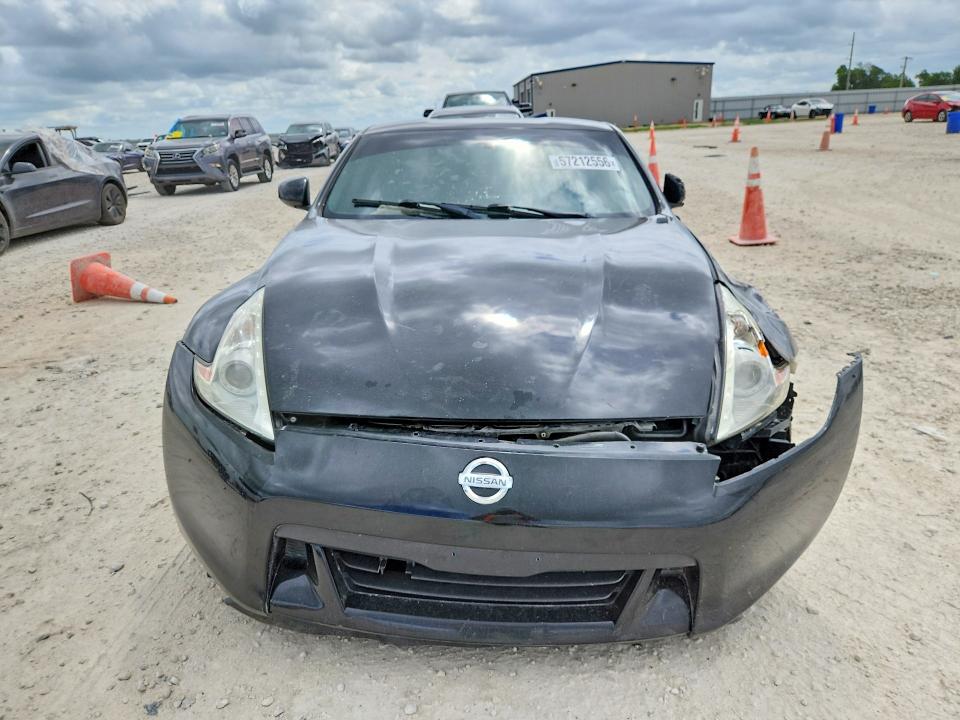2009 Nissan 370z VIN JN1AZ44E79M405997 COPART salvage auction — SIDE, Tx - Salvage Vehicle Title, sold $2,200 on 2026-07-16 (photo 5)