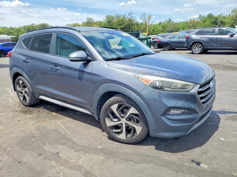 2017 Hyundai VIN KM8J33A26HU575443 COPART salvage auction — MINOR DENT/SCRATCHES, Fl - Certificate Of Title (P), sold $5,700 on 2026-07-22 (photo 4)