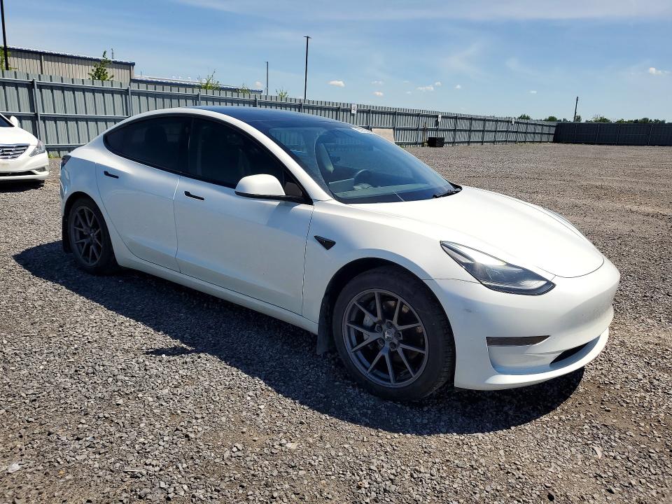2023 Tesla Model 3 VIN 5YJ3E1EA3PF493108 COPART salvage auction — SIDE, ON - PERMIT NO BRAND - UNFIT, sold $2,950 on 2026-07-23 (photo 4)