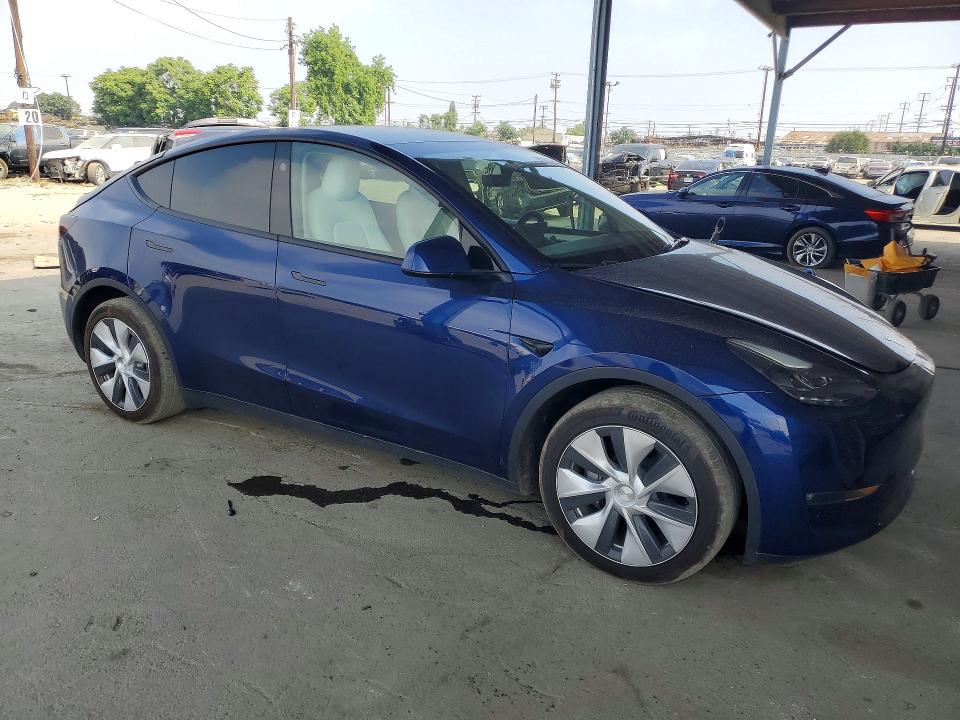 2024 Tesla Model y VIN 7SAYGDEE1RF064947 COPART salvage auction — REAR END, CA - SALVAGE CERTIFICATE, sold $15,200 on 2026-07-23 (photo 4)