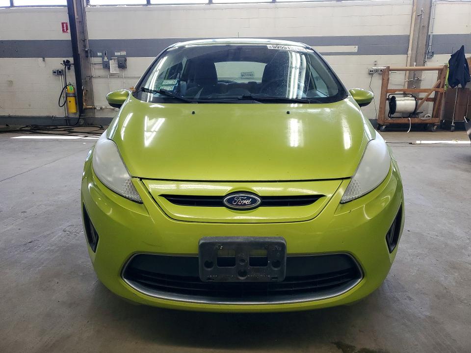 2012 Ford Fiesta VIN 3FADP4EJ9CM101860 COPART salvage auction — MINOR DENT/SCRATCHES, Il - Certificate Of Title, sold $325 on 2026-07-09 (photo 5)